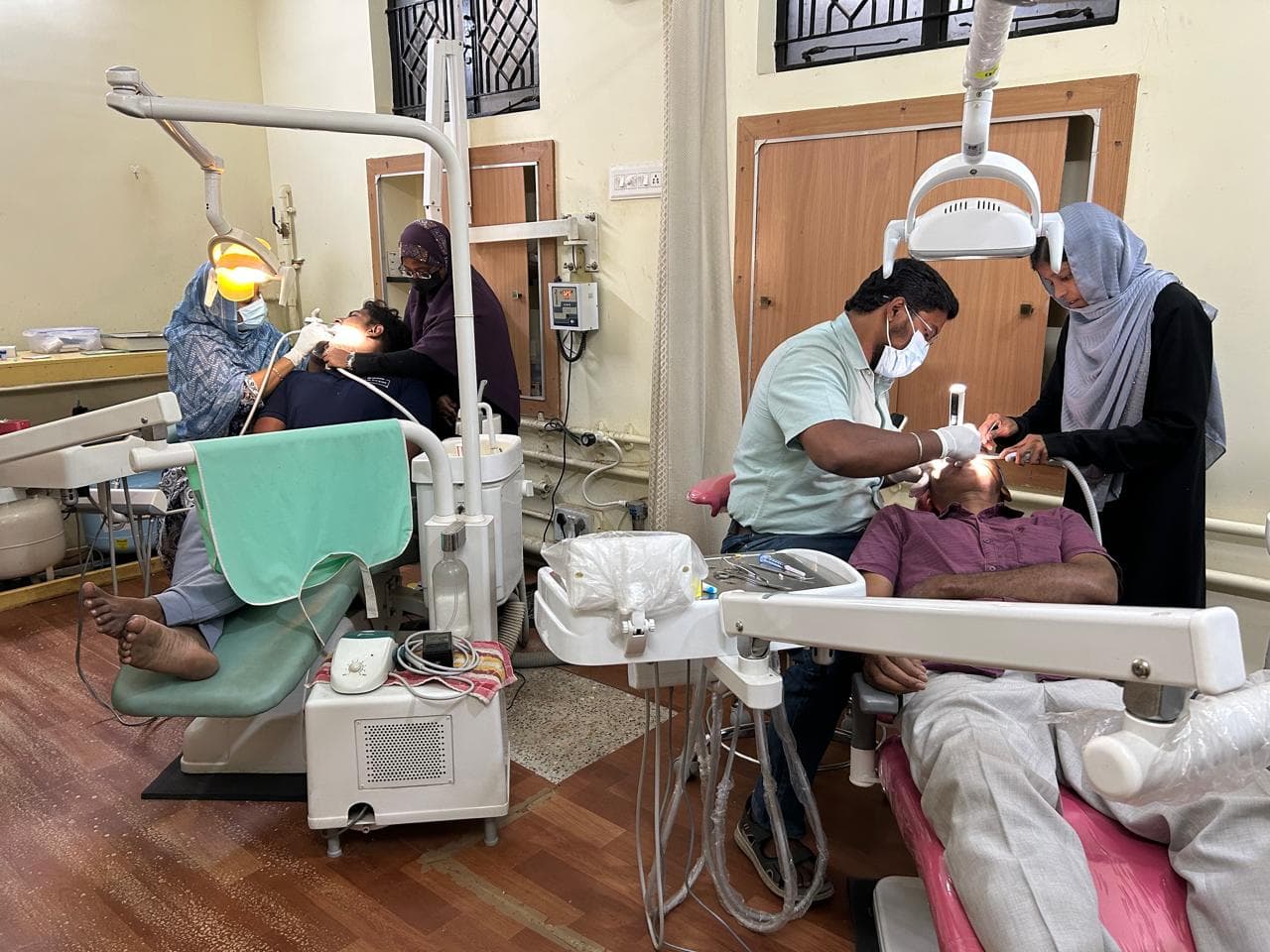 Hidhaya Dental Clinic team treating patients in the treatment room